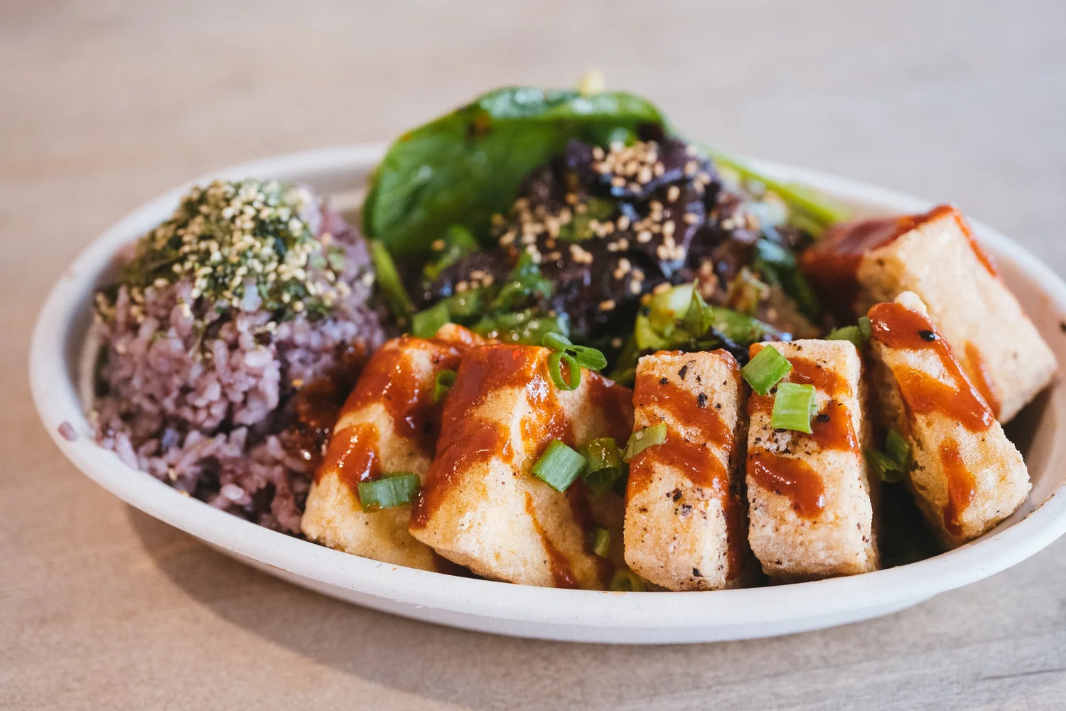 Plate lunch with purple rice